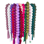 Bundle of ball garlands in mixed colours