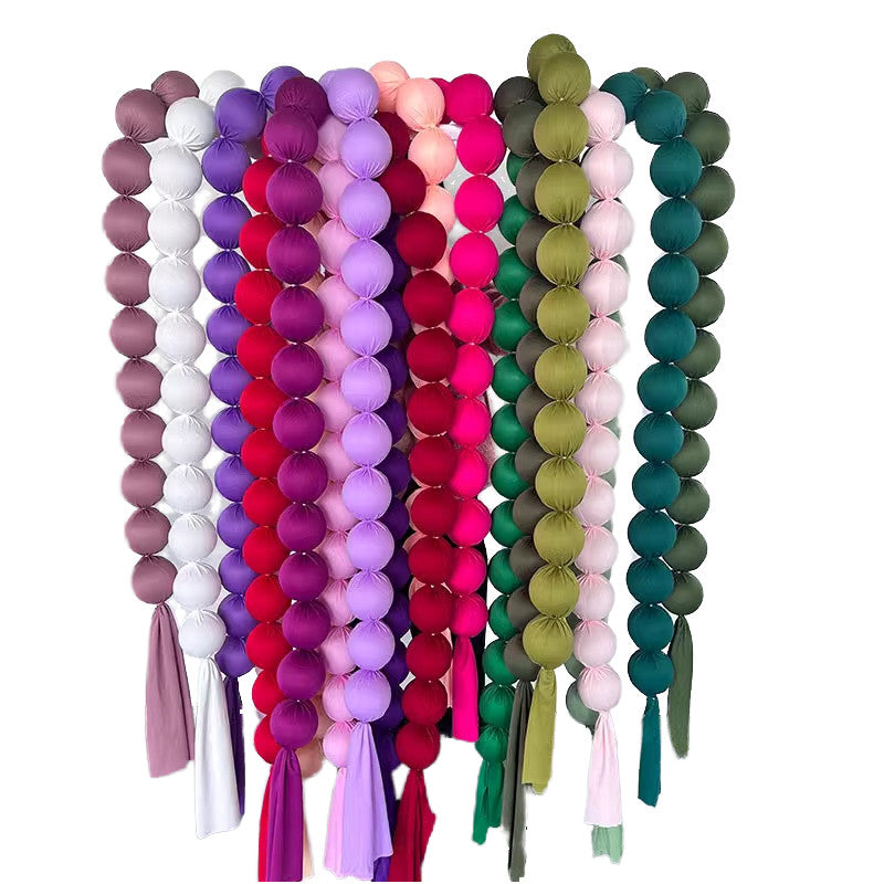 Bundle of ball garlands in mixed colours
