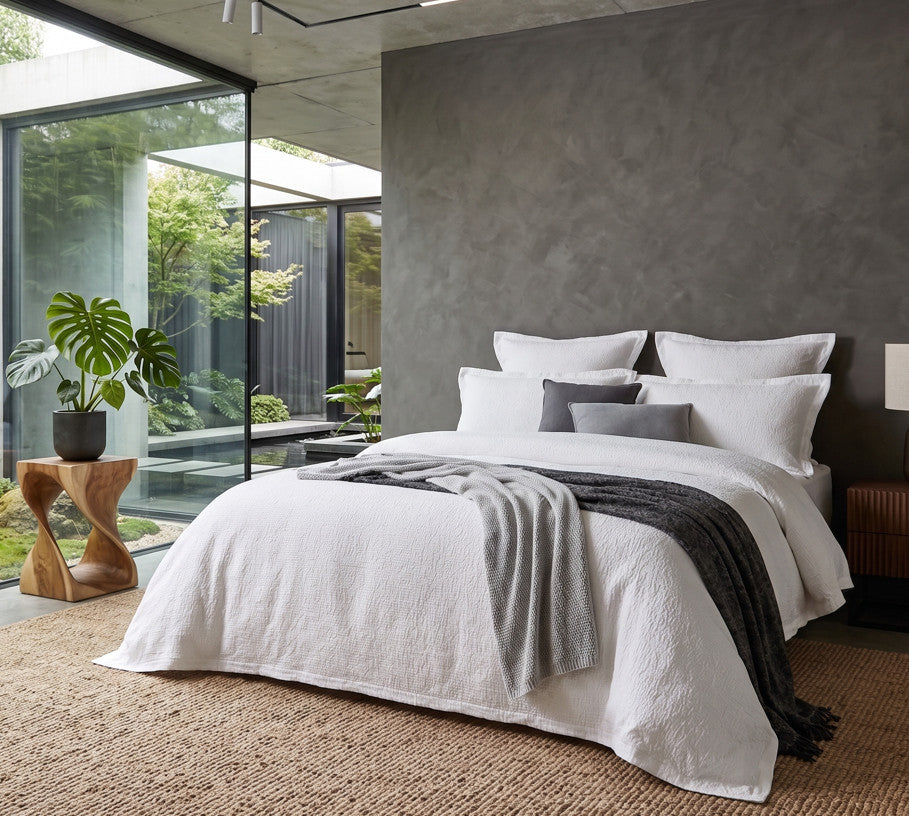 White jacquard quilt cover set with grey throw