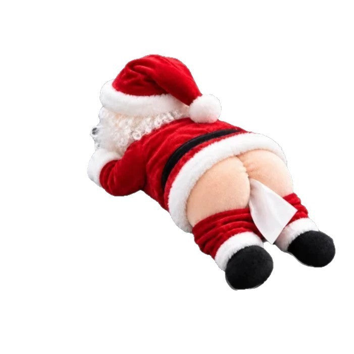 Novelty tissue box cover shaped like Santa lying face down with a tissue on a white background