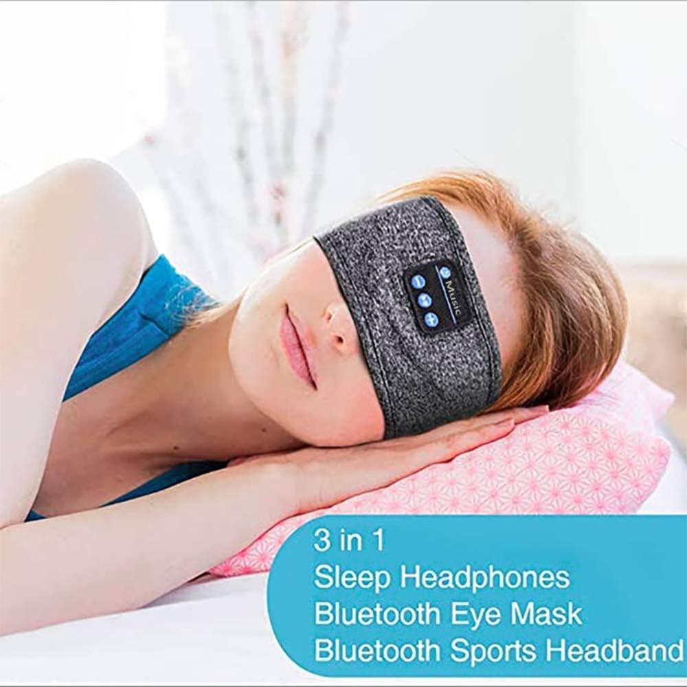 Woman sleeping in the eye mask headphones