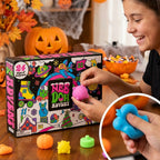 Child squeezing a pink squishy monster toy from the advent calendar