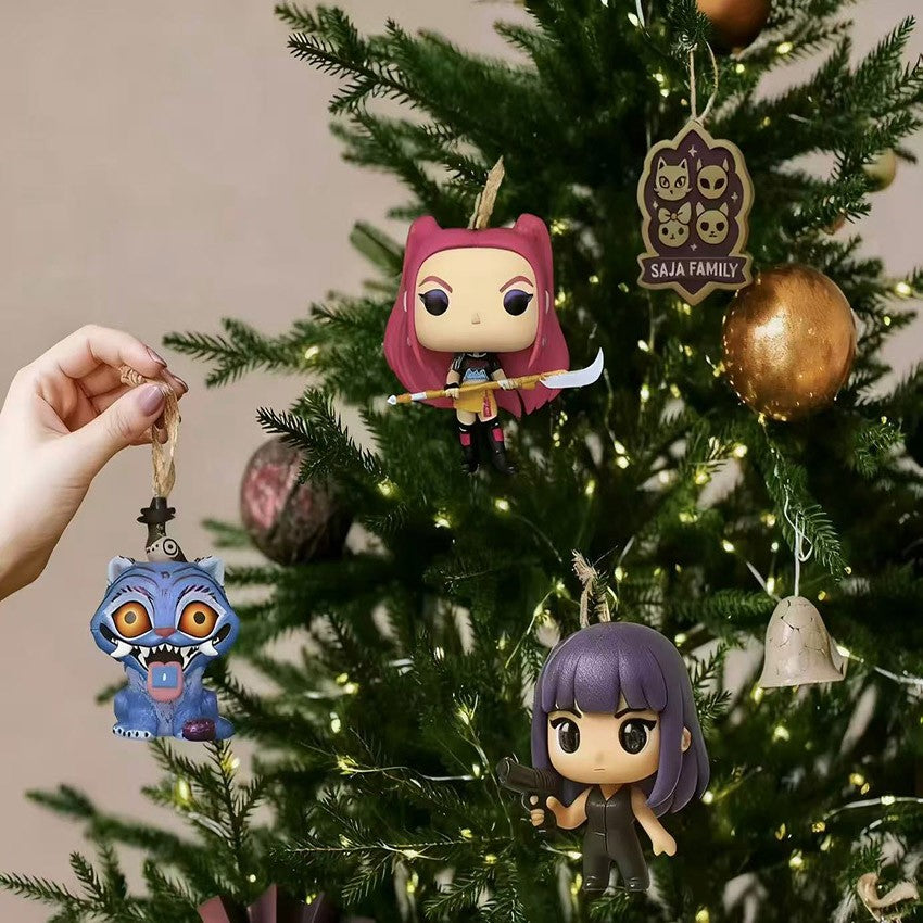 K-pop girl group ornaments hanging on a Christmas tree