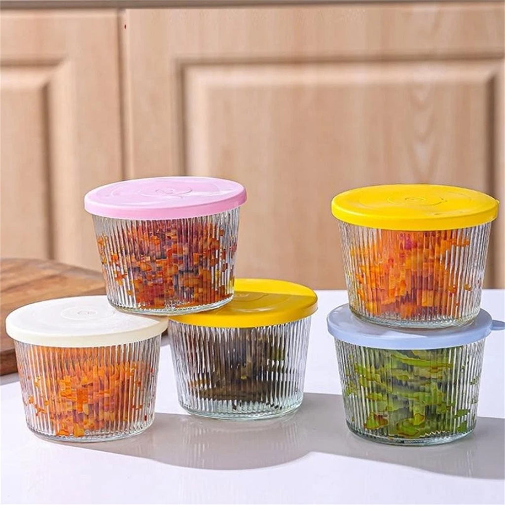 Glass jars stacked in the fridge