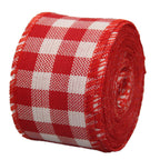Red and white gingham wired Christmas ribbon roll on white