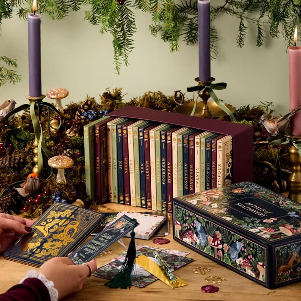 Opening the stationery advent calendar by candlelight