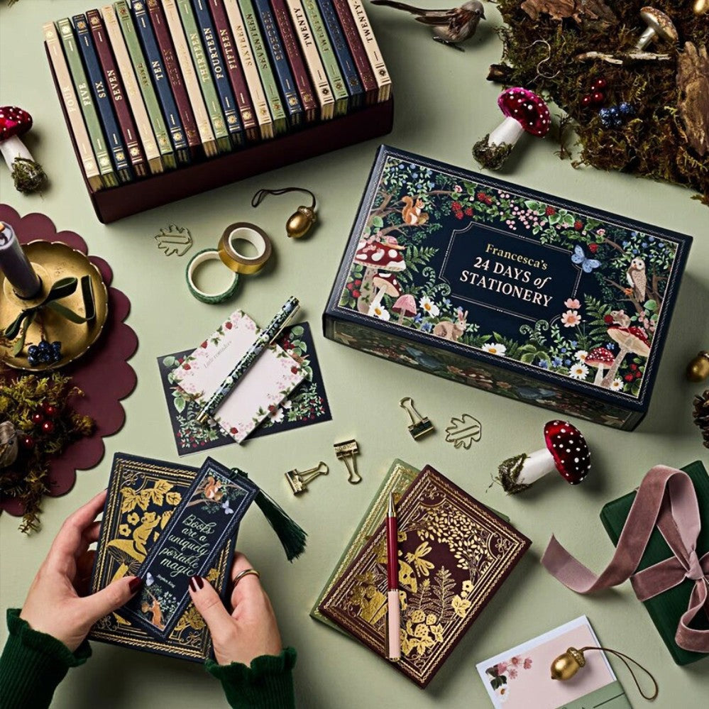 Stationery gifts laid out around the advent calendar