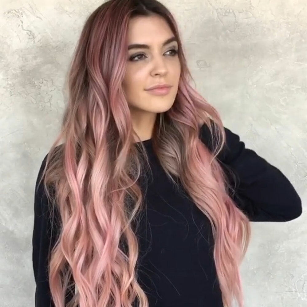 Synthetic fibre detail on pink wig