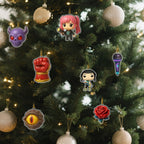 K-pop Christmas ornaments: demon face, fist, eye and microphone on a tree