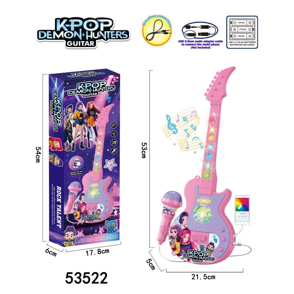 Pink light-up toy guitar with microphone, about 53 cm, beside its box