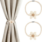 Curtain held back with magnetic flower tieback