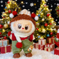 Doll in red Christmas jumper and green overalls