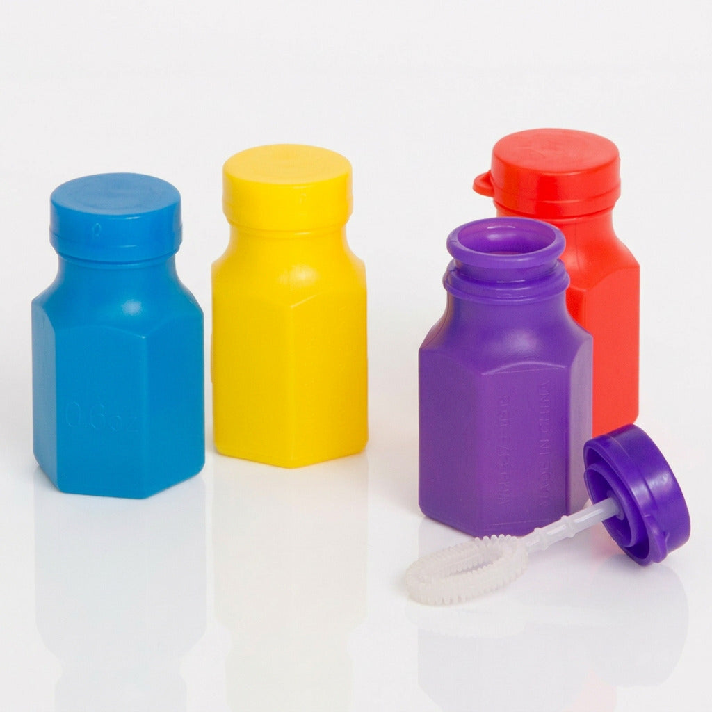 Four mini bubble bottles with wand