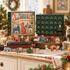 Medieval cat figurines lined up on a kitchen bench beside the advent calendar box