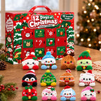12 mini Christmas plush toys lined up in front of the advent calendar box