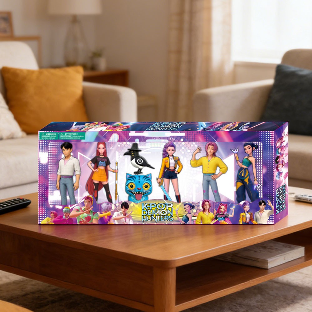Boxed idol singer mini figures on a coffee table