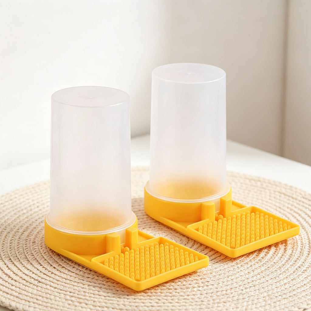 Two bee feeders