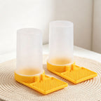 Two bee feeders