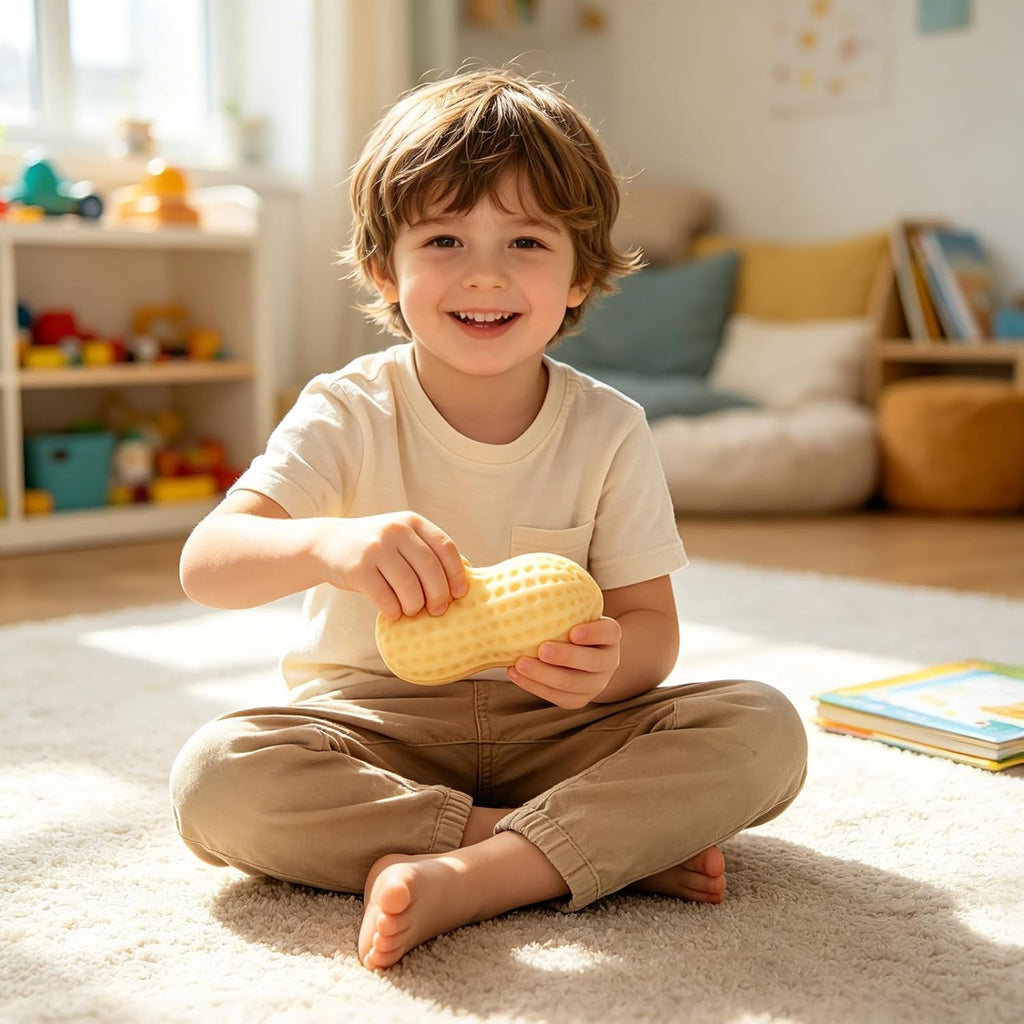 Boy playing with the peanut squishy