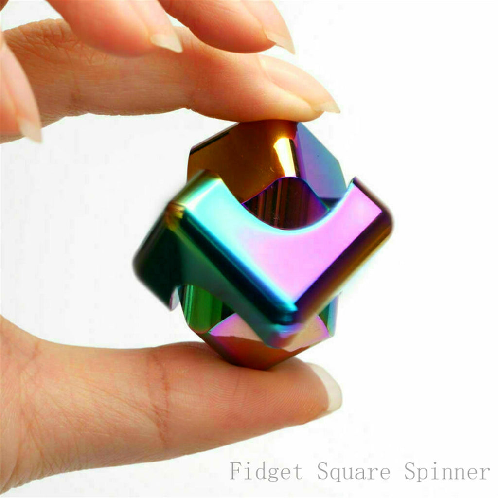 Fidget cube spinning in hand