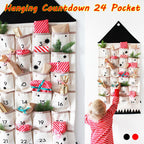 Child filling the hanging 24 pocket fabric advent calendar