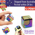 Square fidget spinner cubes held in hand
