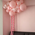 Pink ball garland with balloons
