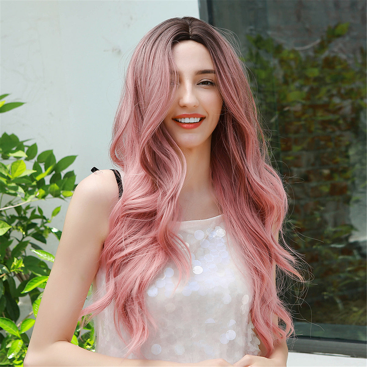 Long pink wig worn for fancy dress