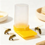 Bee feeder with bees on the tray