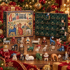 Ugly medieval cats advent calendar with open drawers and cat figurines on a table