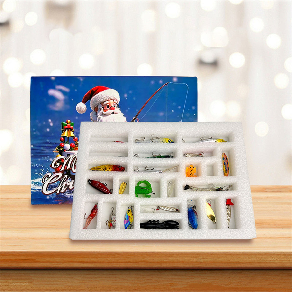 Fishing advent calendar foam tray with 24 compartments of lures in front of the Santa box