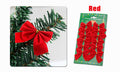 Red Christmas bow on a tree branch and a 12 pack of red bows